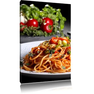 Leinwandbild Schmackhafte Spaghetti Italia mit Kräutern