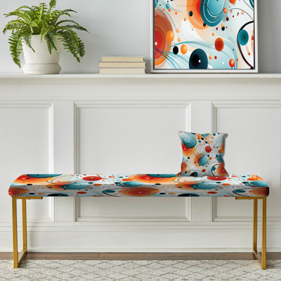 Banc rembourré géométrique doré