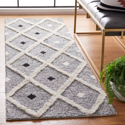 Hartnell Hand Tufted Wool/Cotton Geometric Rug in Black/Ivory