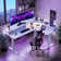 Meachie 63" Adjustable L Shaped Computer Standing Desk with 3 Drawers & Power Outlets & LED Lights