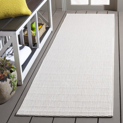 Tiza Solid Colour Machine Woven Polyester/Polypropylene Indoor/Outdoor Area Rug in Ivory