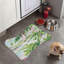 Tapis rose et vert à motif de feuilles - 1 pièce