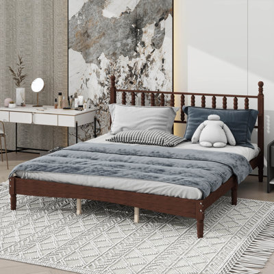 Très grand lit plateforme en bois avec tête de lit de style gourde