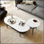 Petite table d'appoint ronde en métal, table de chevet étroite avec un design pointu pour une vie moderne et peu encombrante