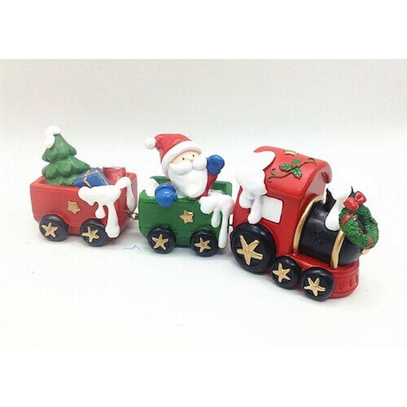 Figurine de père Noël en train