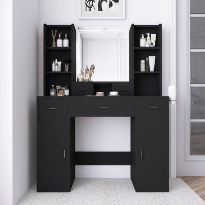 La coiffeuse avec miroir à DEL équipé d'un support pour sèche-cheveux et d'un pansement