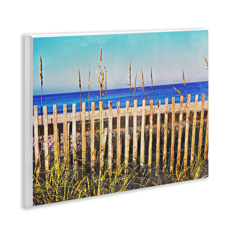 Art mural sur une plage clôturée en Floride par Bill Carlson, photographie