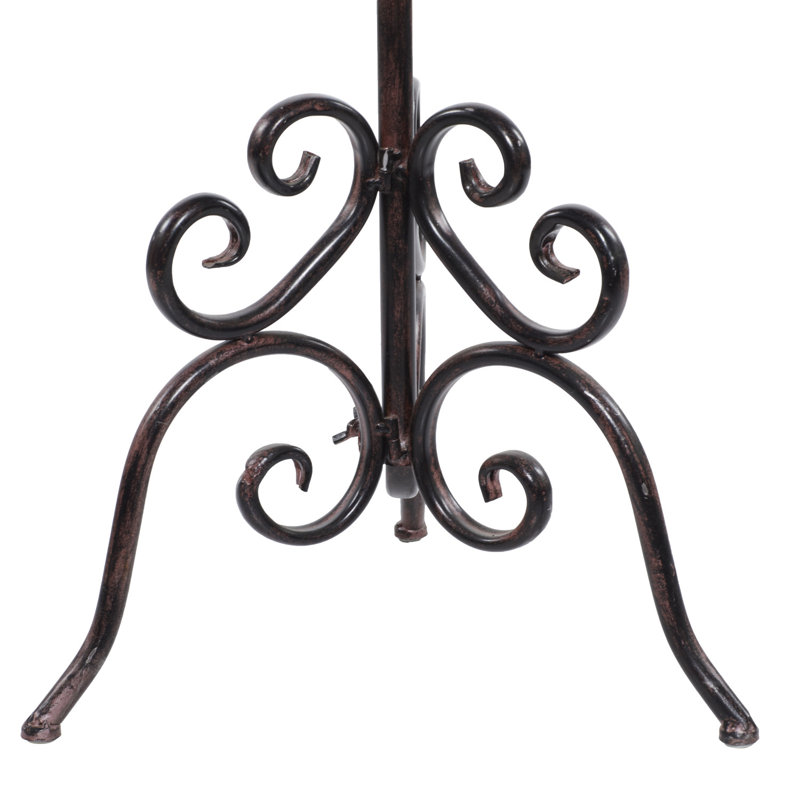 Grand candélabre brun en métal avec motifs à volutes