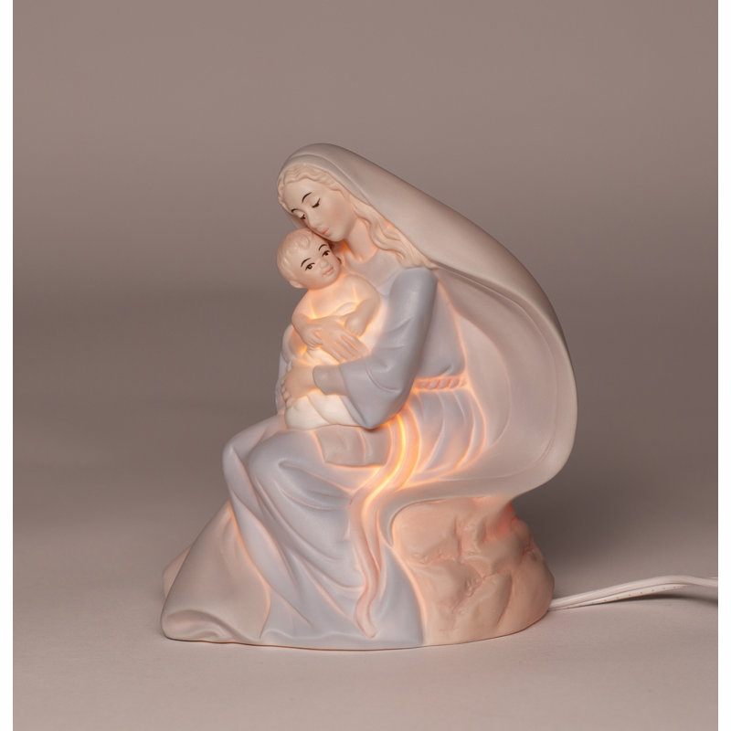 Madone tenant une veilleuse pour bébé