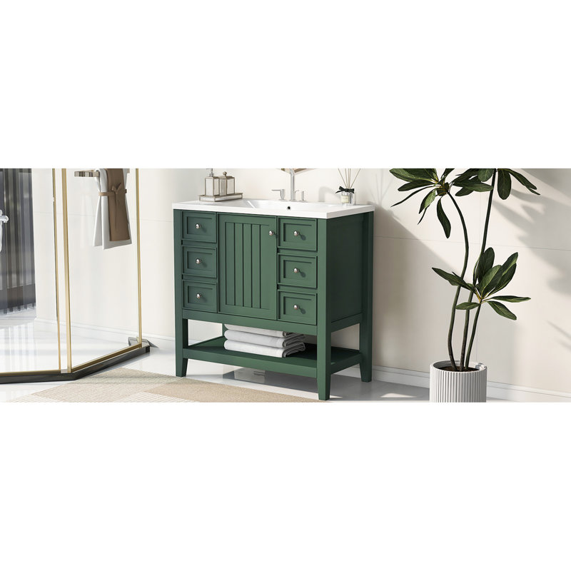 Meuble-lavabo de 36 po comprenant une armoire en bois massif, trois tiroirs, un lavabo en céramique avec poignées rondes argentées à l'épreuve de l'eau et une tablette réglable