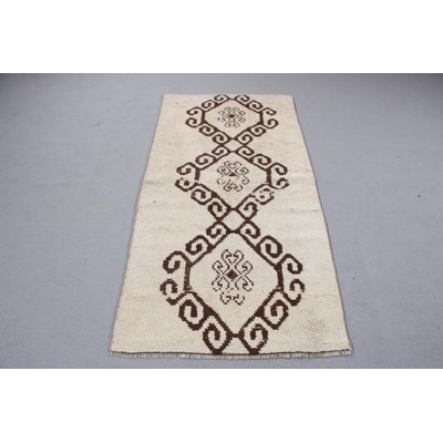 Tapis beige beige en laine pour décoration de chambre à coucher