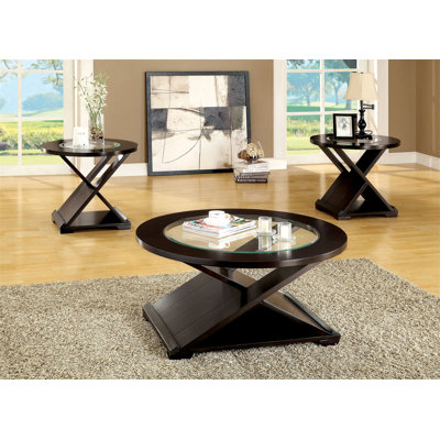 Table basse d'appoint de style contemporain avec base unique en forme de croix et plateau en verre de 5 mm soutenu par une structure en bois massif au fini espresso