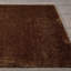 Tapis uni en polypropylène tissé à la machine en brun-86184007