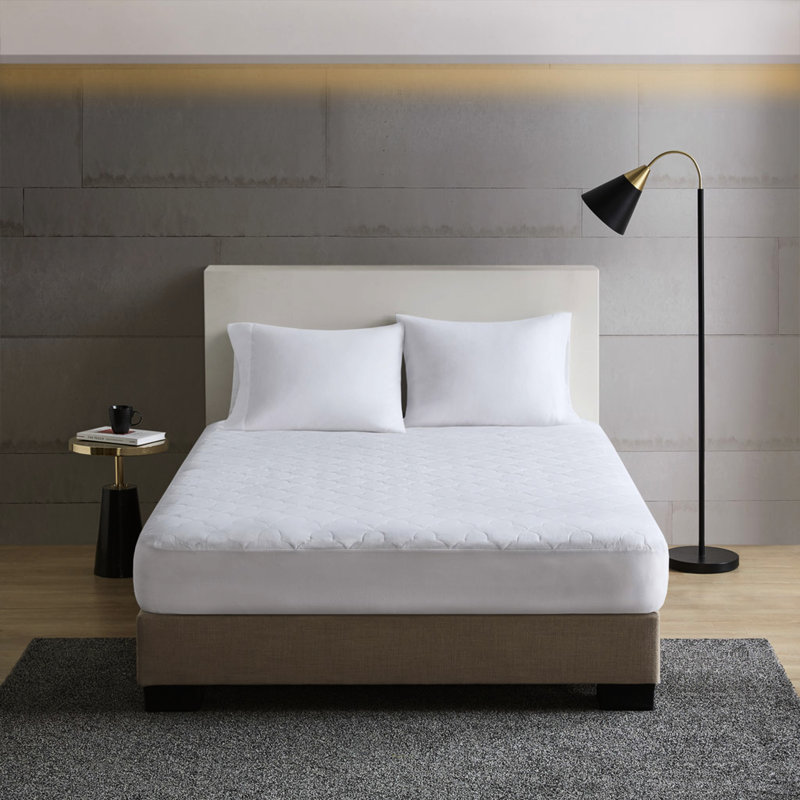 Le coton simple TG offre une surface de couchage confortable qui absorbe et vous garde au frais