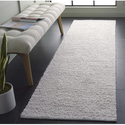 Tapis rose / ivoire en coton tissé à la main Cynda Renewal