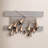 Golden Iron Bell Garland with Rustic Charm