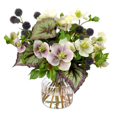 Thistle and Hellebores in Ribbed Glass Vase
