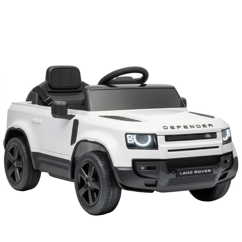 Voiture électrique 12 V pour enfants, Land Rover Defender sous licence, avec télécommande, suspension à 4 roues, démarrage progressif, 3 vitesses, véhicule à batterie avec lumières et musique.