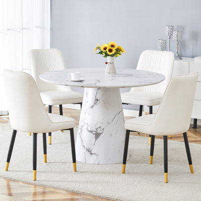 Nerita 4 - Person Pedestal Dining Set