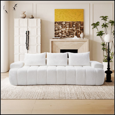 Très grand canapé modulaire compressé à l'avant courbé avec tissu bouclé en forme de nuage et noyau en mousse à haute résilience