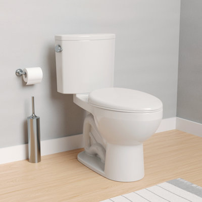 Toilette allongée deux pièces à hauteur de fauteuil 1,28 GPF avec levier gauche - siège sans siège