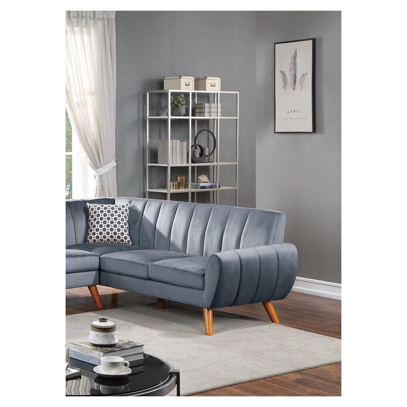 Ensemble canapé d'angle contemporain 2 pièces en velours gris foncé, comprenant un canapé d'angle à gauche et une causeuse d'angle à droite.