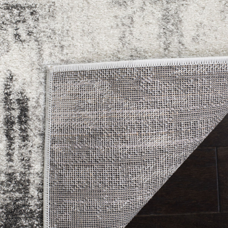 Riebe Abstract Ivory/Grey Area Rug, Rectangle 6' x 9'