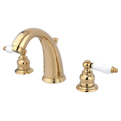 Kingston Brass Victorian Two-Handle 3-Hole Deck Mount Widespread Bathroom Faucet with Retail Pop-Up Drain