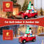 Grand père Noël conduisant une voiture gonflable