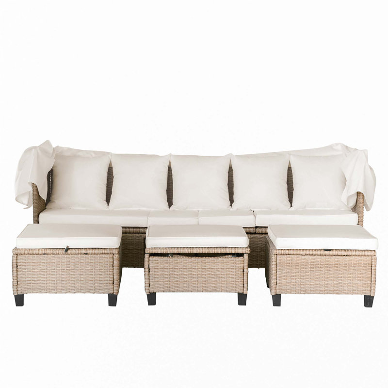 Ensemble 4 pièces de canapé de patio en résine tressée résistant aux rayons UV avec auvent rétractable, coussins et table élévatrice