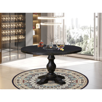 La table de petit déjeuner avec plateau rond en bois d'acacia et base piédestal élégante - Finition noire sablée