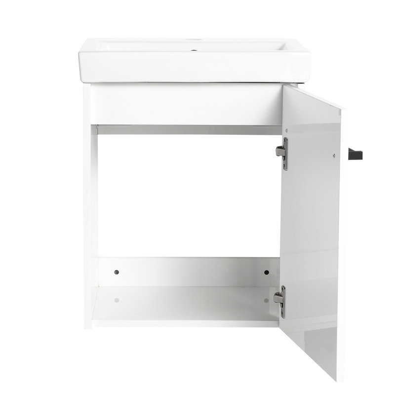 Meuble-lavabo de 18 po. Lavabo en céramique avec porte d'armoire à fermeture en douceur. Look moderne pour les salles de bain compactes. Fabrication en contreplaqué pour une utilisation en douceur. Concevez de petits espaces. Fabriqué