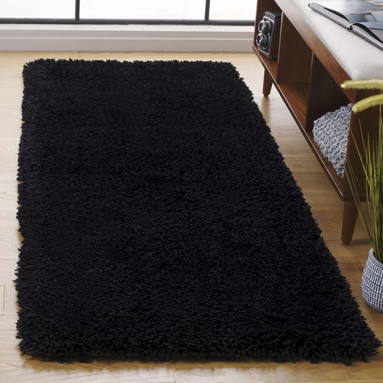Assar Black Area Rug
