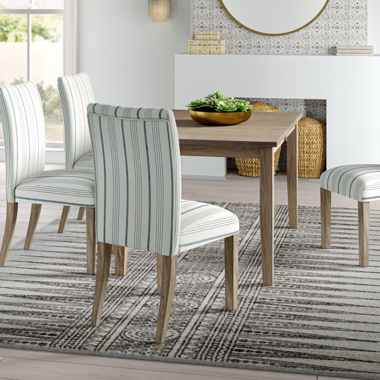Fergerson - Person Extendable Four Leg Dining Set