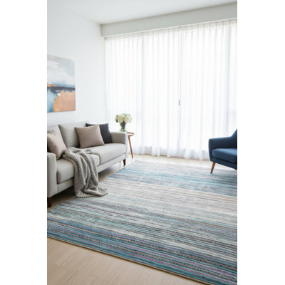 Tapis décoratif rayé bleu, beige et gris