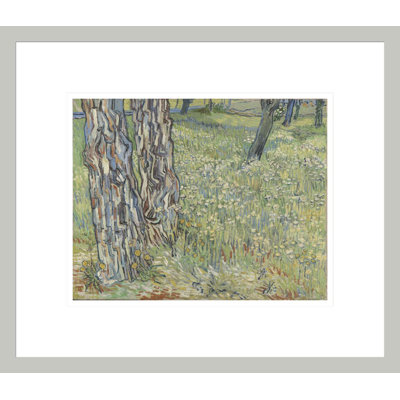 Troncs d'arbre dans l'herbe par Vincent van Gogh, impression giclée encadrée