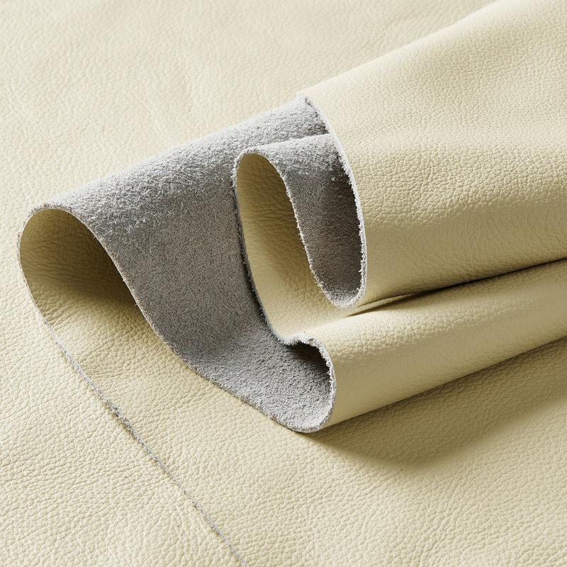 Canapé modulaire avec repose-pieds de gauche en cuir véritable de 139,5 po Antanisha, Cuir véritable blanc