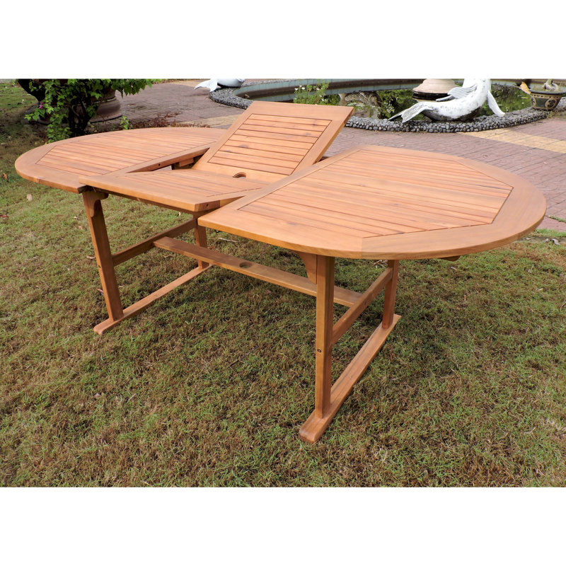 Clemmons Oval Acacia Extendable Outdoor Dining Table With Umbrella Hole , in. W 39.5'' in. D, Rustic Brown