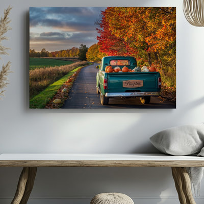 Reproduction d'art sur toile, une camionnette sarcelle rétro avec sa peinture légèrement patinée sous la lueur chaleureuse d'un soleil couchant