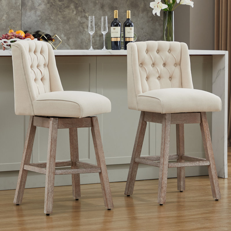 Tabourets de bar rembourrés et pivotants à 360 ° Terron avec pieds en bois Terron, Beige