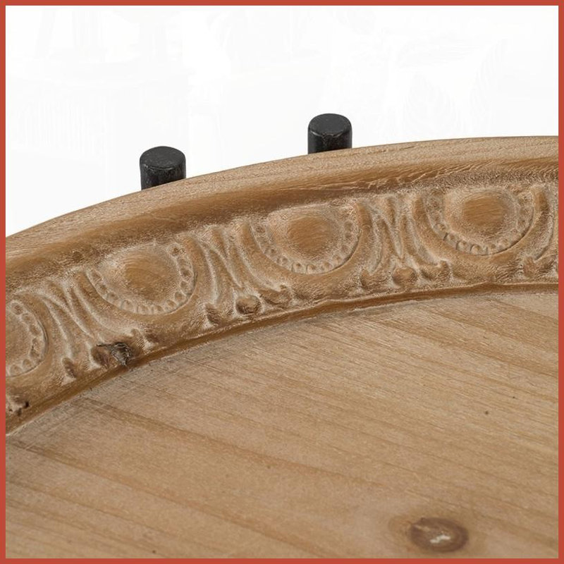 Table basse ronde moderne en bois avec pieds en métal, contraste saisissant pour le salon