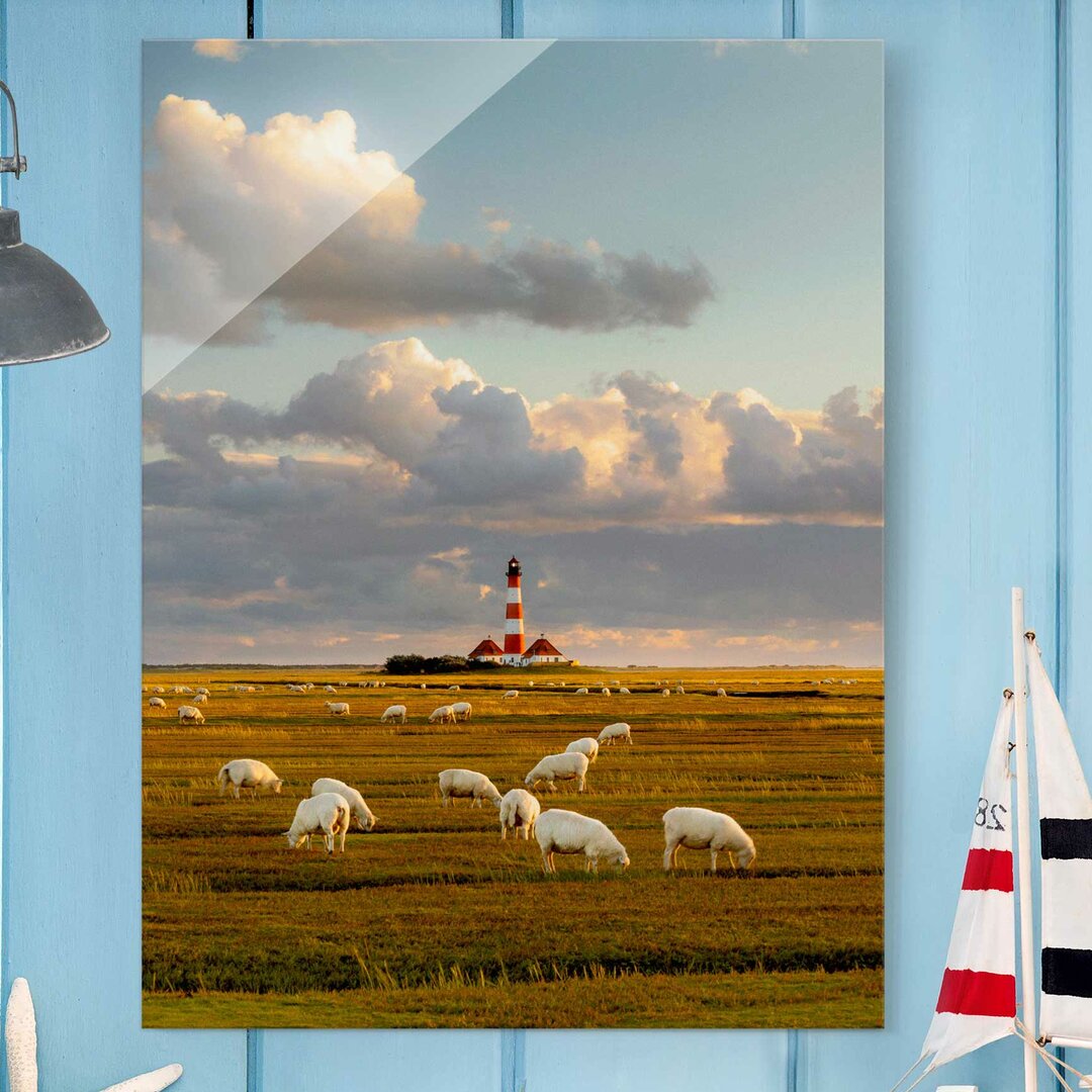 Glasbild Nordsee-Leuchtturm mit Schafherde