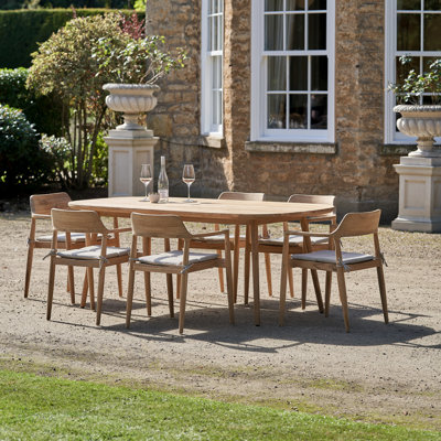 Himmelmann 6 - Person Solid Wood Patio Dining Set Oval Table with Cushions Included