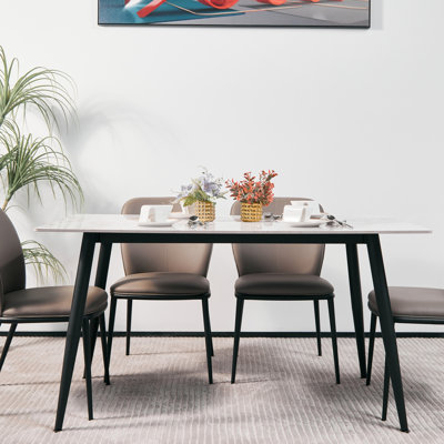 Modern Minimalist Dining Table(1.4M) With Sintered Stone Top And Sleek Tapered Metal Legs For A Contemporary Kitchen Or Dining Room