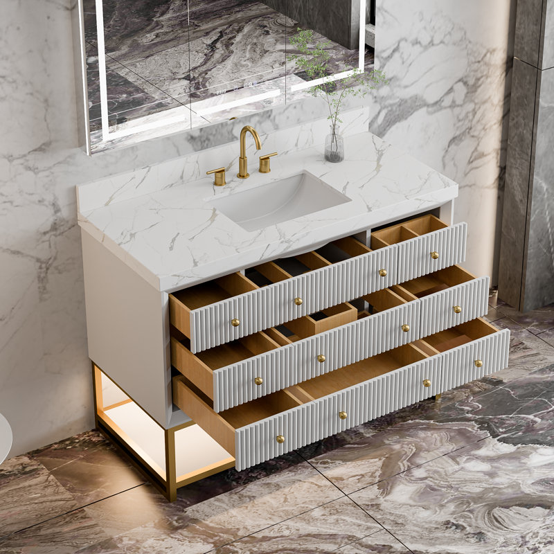 Meuble-lavabo autoportant 48 po avec base à DEL, tiroirs cannelés, plateau en pierre d'ingénierie et structure en métal doré - Finition blanche