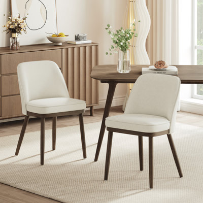 Chaise rembourrée en bois massif
