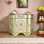 European style half-circle painted accent cabinet