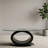 Vanna 47 In. Black Oval Glass Coffee Table With High Gloss O-Shape Pedestal Base