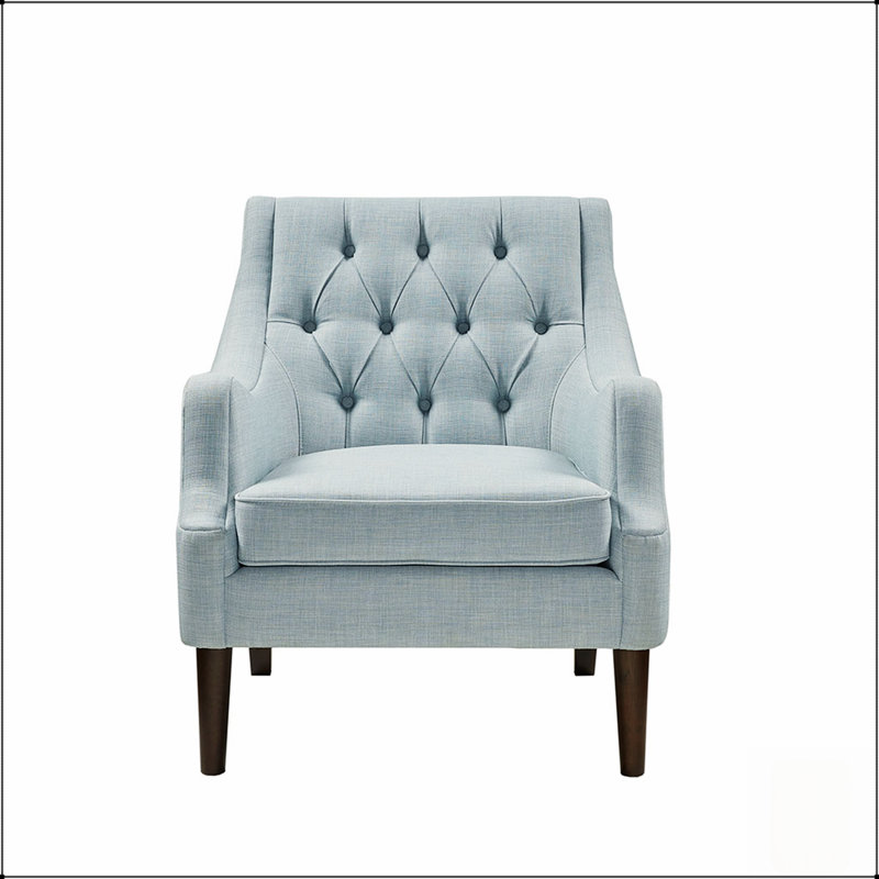 Fauteuil d'appoint capitonné à boutons, offrant une assise confortable et un design élégant, idéal pour les salons et les bureaux à domicile.
