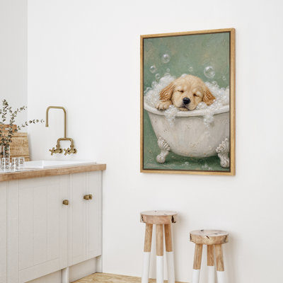 Tableau encadré représentant un chiot doré prenant un bain moussant, imprimé sur toile, à accrocher dans la chambre parentale.